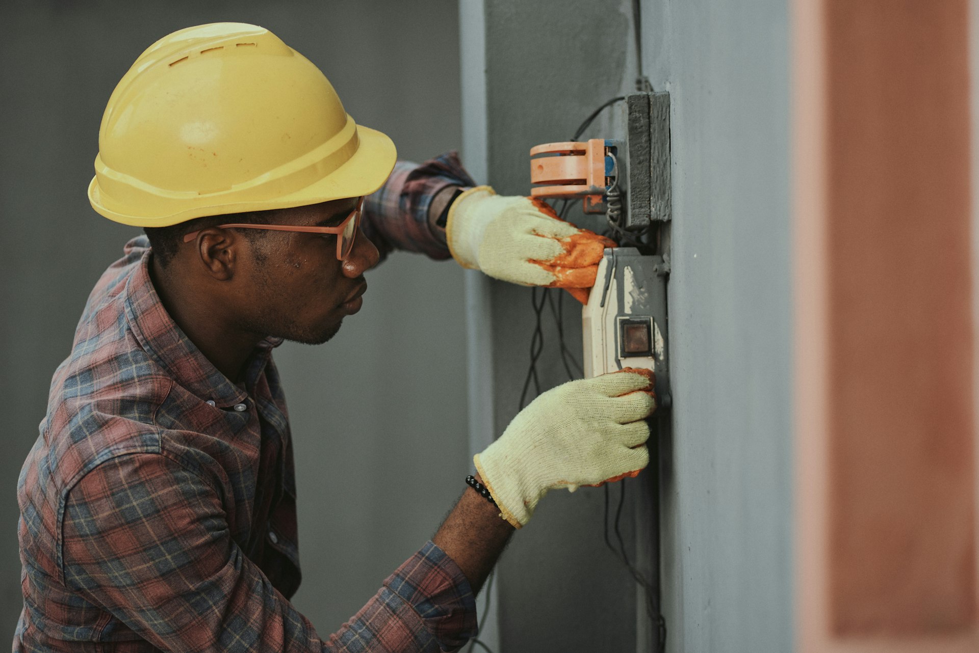 Electrician completing a residential electrical installation in Memphis, TN